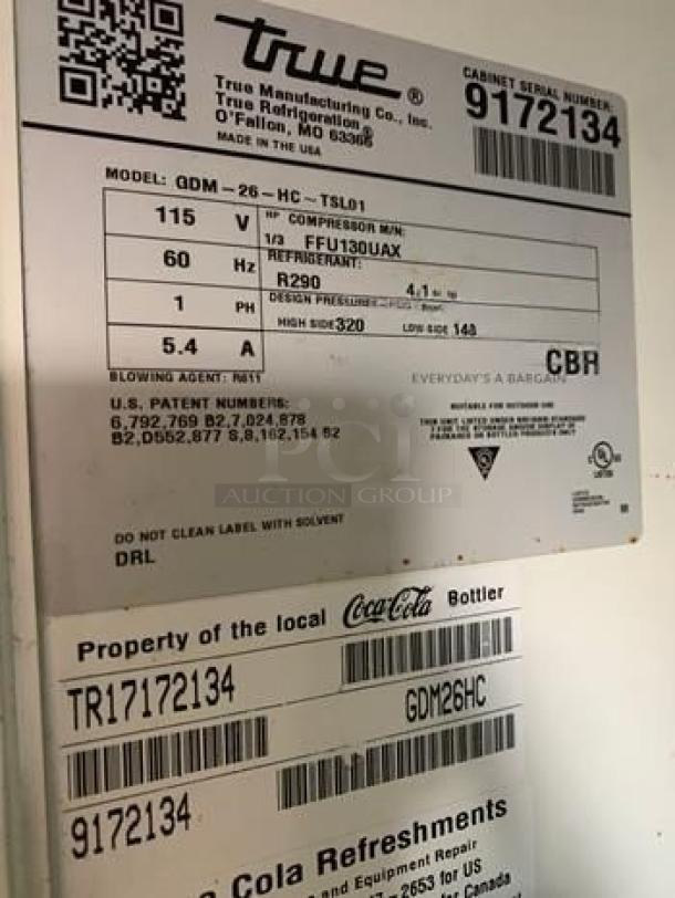 True GDM-26-HC-TSL01 commercial refrigerator labels showing 115V, model, serial number 9172134, and UL listing.