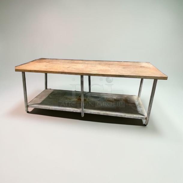 Commercial butcher block prep table, 96-inch, heavy-duty wood top, excellent condition. Model: PREP-M-TBL-0551.