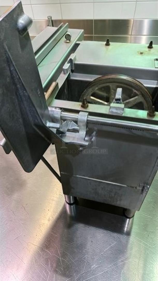 Hobart 5614 commercial meat saw, 2 HP, 3 phase, excellent condition, NSF certified, fully operational.