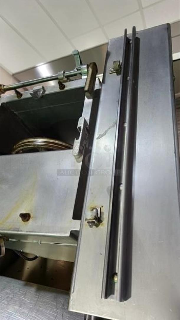 Hobart 5614 commercial meat saw in excellent condition, 2 HP, 3-phase, NSF certified, fully tested, and operational.