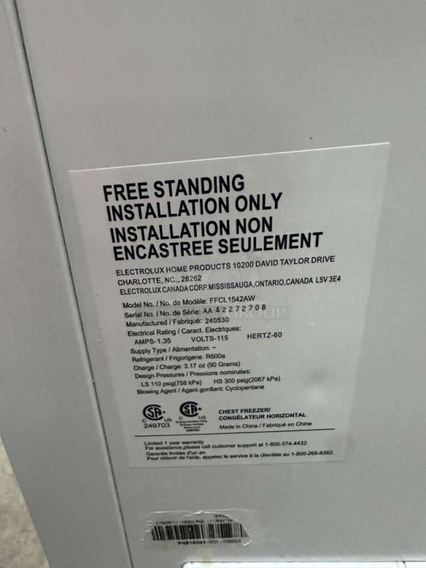 Alt text: Electrolux FFCL1542AW chest freezer, excellent condition, UL listed, 115V. Label shows model info, serial number, and specs.