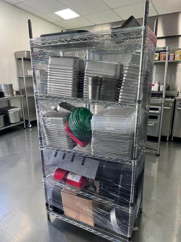 4-tier chrome wire shelving unit with food pans, accessories; heavy-duty, premium condition, inspected; 36x18 inches.
