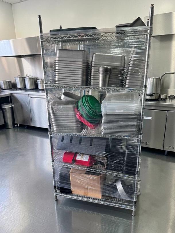 Premium 4-tier NSF chrome wire shelving rack with food pans and accessories. Heavy-duty, 36"x18", inspected, excellent condition.