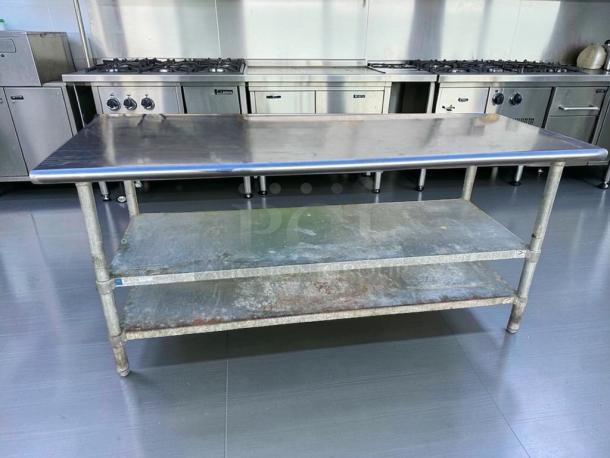 Commercial stainless steel work table with double undershelf, fully inspected, excellent condition, model SST-M-TBL-0573.