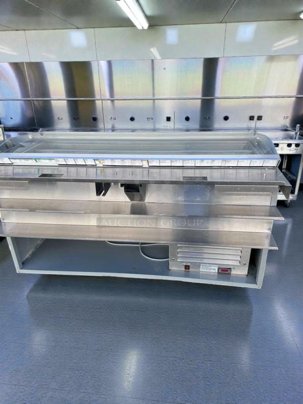 Commercial refrigerated deli display case with glass sneeze guard. Excellent condition, fully operational, Model DEL-L-REF-0576.