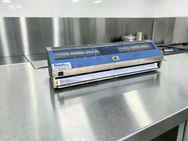 Curtain Products IBD-2-36-1-SS 36” commercial air curtain in superb condition on stainless steel counter, UL listed.