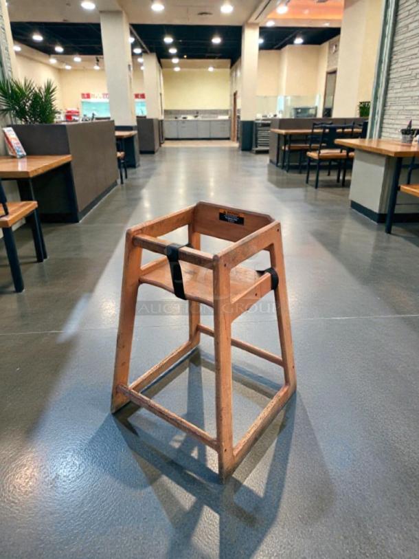 Commercial wooden restaurant high chair, heavy-duty, fully inspected, prime condition, with safety straps. Model: FUR-S-HCHAIR-0580.