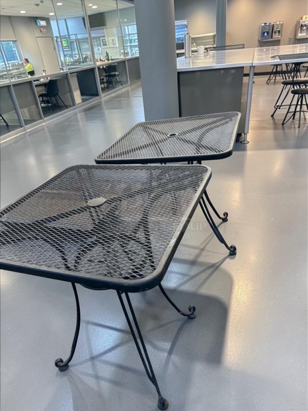 Commercial-grade 32” square metal patio table with mesh top, umbrella hole, heavy-duty construction, excellent condition.