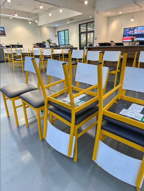 Commercial restaurant dining chairs with upholstered seats and backs, heavy-duty metal frames in elite condition, model FUR-M-CHR-0583.