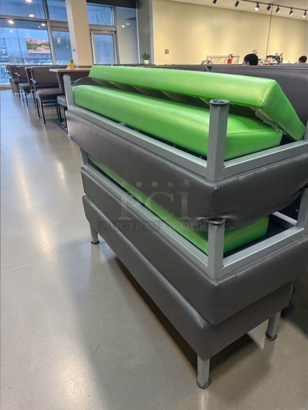 Commercial Grade restaurant booth with green upholstered vinyl cushions and heavy-duty frame. Superb condition, fully inspected.