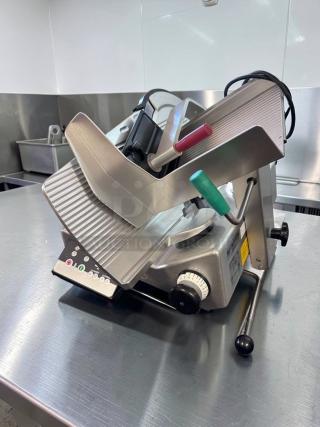 Bizerba N-22 commercial deli slicer, exceptional condition, fully tested, 120V. Features adjustment dial, power switch.