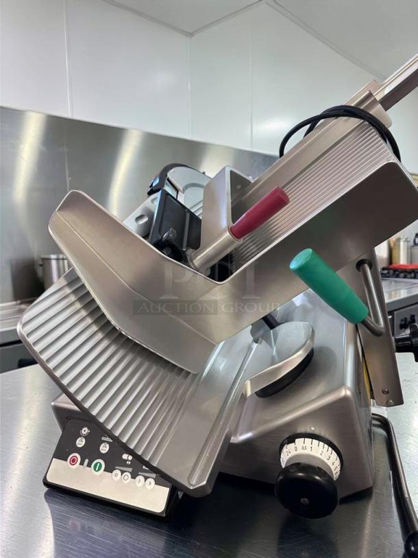 Bizerba N-22 commercial deli slicer in exceptional condition. Features 120V, precision dial, fully tested. Model BIZ-/-SLC-0587.