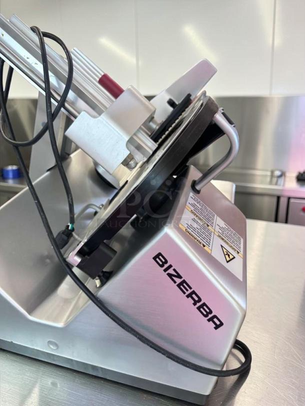 Bizerba N-22 commercial deli slicer, exceptional condition, 120V, fully tested, visible Bizerba branding, model marked.