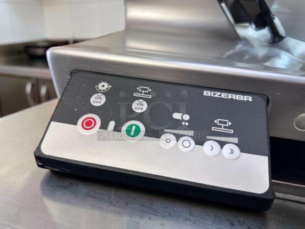 Bizerba N-22 commercial deli slicer in exceptional condition, control panel close-up showing operational buttons, 120V.