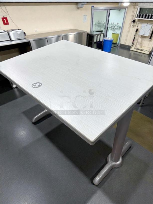 Superior condition commercial dining table, laminate top, heavy-duty metal base, fully inspected, ready for use.