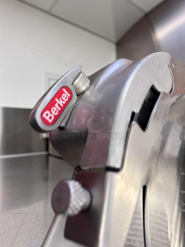 Berkel 909/1 commercial manual meat slicer, superb condition, showing Berkel branding. 115V, NSF listed, fully operational.