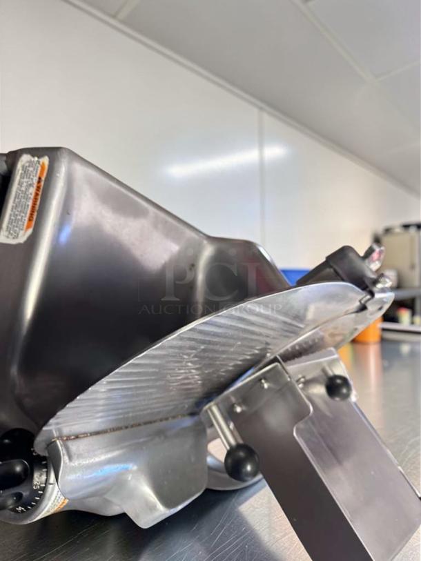 Berkel 909/1 commercial meat slicer in superb condition. NSF listed, 115V, fully tested and operational.