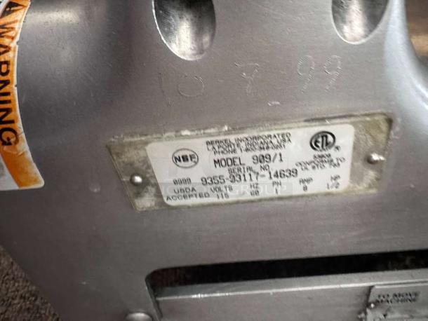 Berkel 909/1 meat slicer with NSF, ETL labels, showing model 909/1. Serial 935-93117-14699. USDA accepted, 115V, 1/2HP.