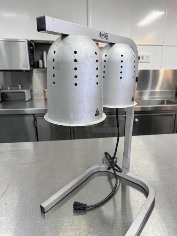 Avantco Dual Heat Lamp Food Warmer Station, model AVT-S-WRM-0600, in exceptional condition; stainless steel, fully operational.