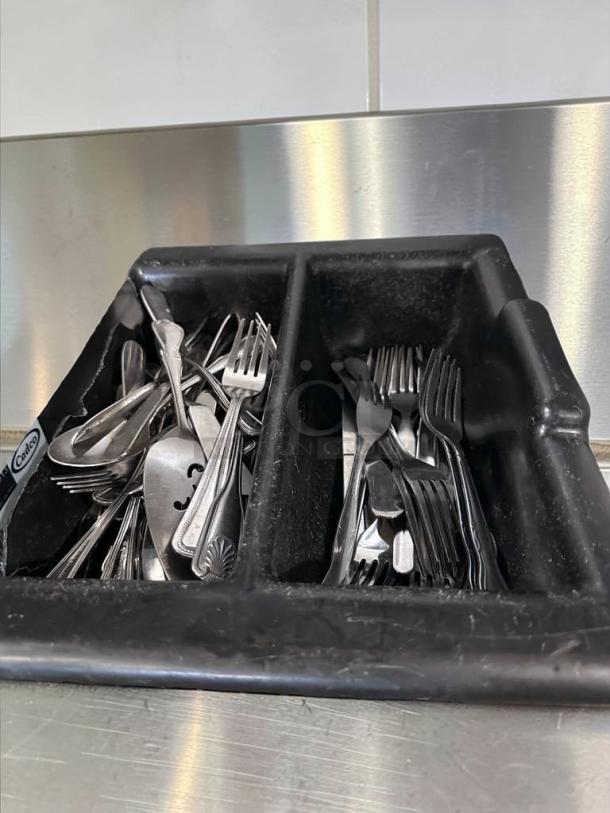 Commercial stainless steel flatware lot in exceptional condition. Mixed pattern forks and spoons by Commercial Restaurant Supply.