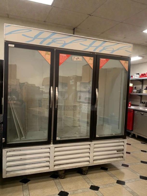 Beverage-Air CRG74-1 3-glass door fridge, superior condition, 115V, fully tested. Ideal for commercial use.
