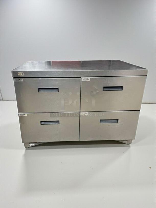 Delfield undercounter refrigerator UCD4448N, pristine condition, with four drawers, stainless steel, 115V, single phase.