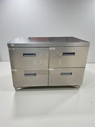 Delfield undercounter refrigerator UCD4448N, pristine condition, with four drawers, stainless steel, 115V, single phase.