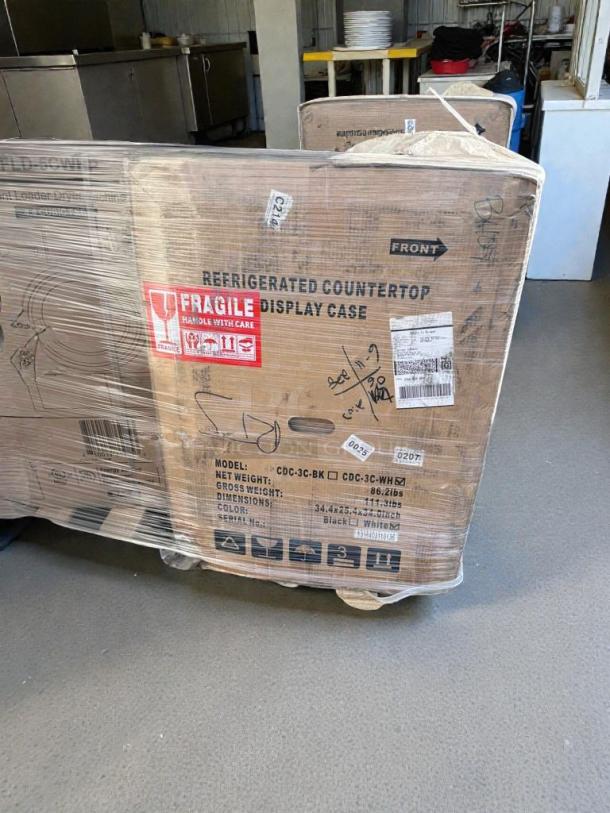 KoolMore Refrigerated Countertop Display Case in packaging, model CDC-3C-BK/WH, brand-new condition, scratch & dent.