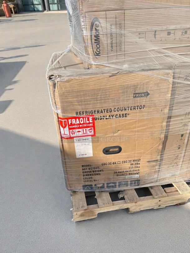 Brand-new KoolMore refrigerated countertop display case in box, model CDC-3C-BK / CDC-3C-WH. Scratch & Dent. Dimensions: 34.4x25.4x34 in.