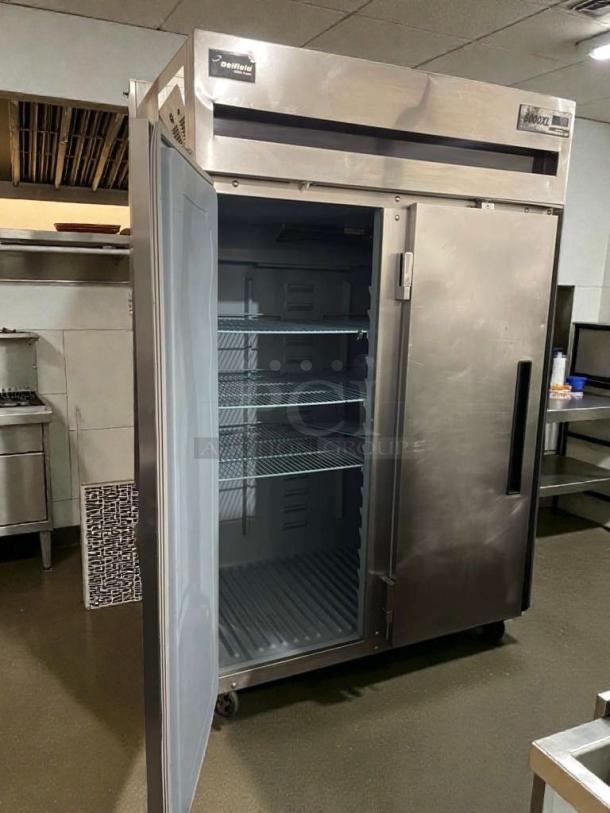 Delfield 6151XL-S15 commercial refrigerator, single door open, stainless steel, shelves visible, excellent condition.