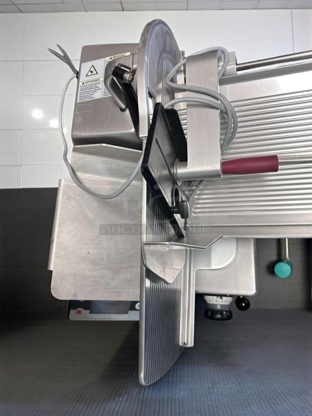 Bizerba GSP HD IW-90 GCB commercial meat slicer, semi-automatic, exceptional condition, fully tested, visible safety warnings.