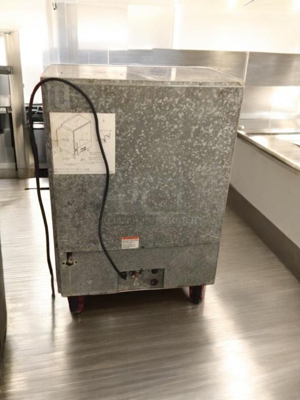 Manitowoc QY0214A commercial ice maker in pristine condition, tested and working. Features 115V, single phase. Labels visible.