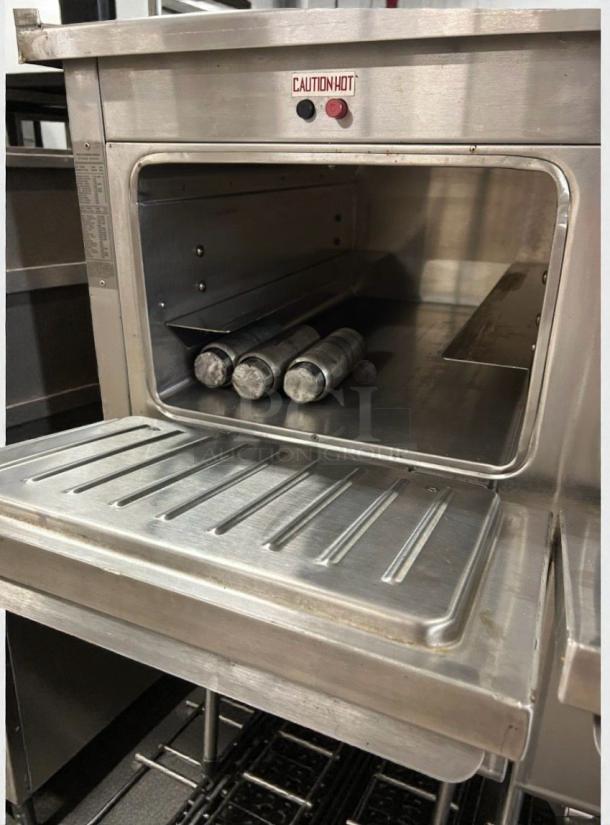 Duke Thermotainer Heated Holding Cabinet in excellent condition, 208V/3 Phase, fully tested and working, with caution hot label.