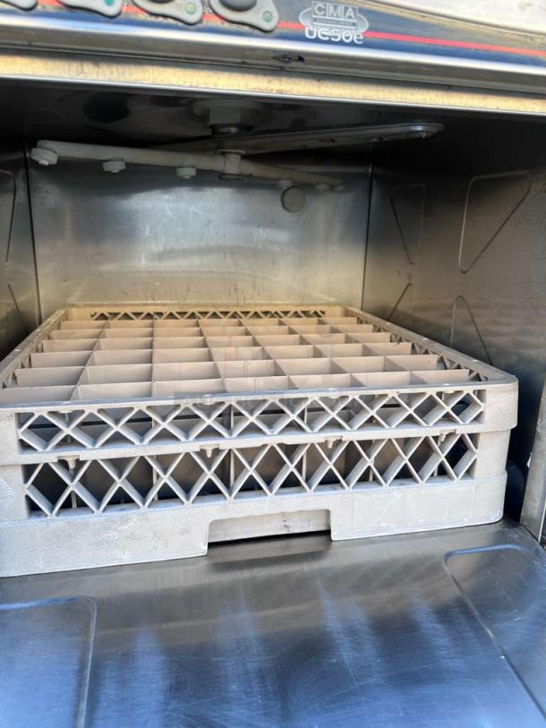 CMA/Kromo UC50e undercounter dishwasher, UL listed, 220–240V, fully tested. Interior view with dishwasher rack.