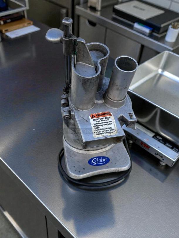 Globe GFP-500 commercial food prep machine in excellent condition, 115 V, NSF & UL certified, fully tested and working.