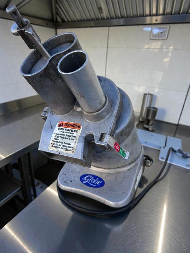 Globe GFP-500 commercial food machine, excellent condition, 115V, NSF & UL certified, warning label visible, stainless steel finish.