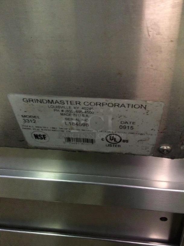 Grindmaster 3332 commercial slush machine label, model 3332, serial L184698, NSF certified, made in USA, date 0915.