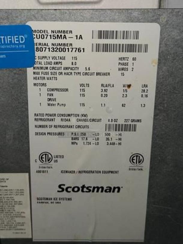 Label on Scotsman CU0715MA-1 ice machine showing model, voltage, and capacity details. UL and ETL listed.