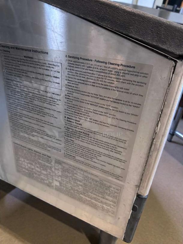 Hoshizaki KM-260BAH ice maker label with cleaning instructions, premium condition, NSF & UL listed, model details visible.