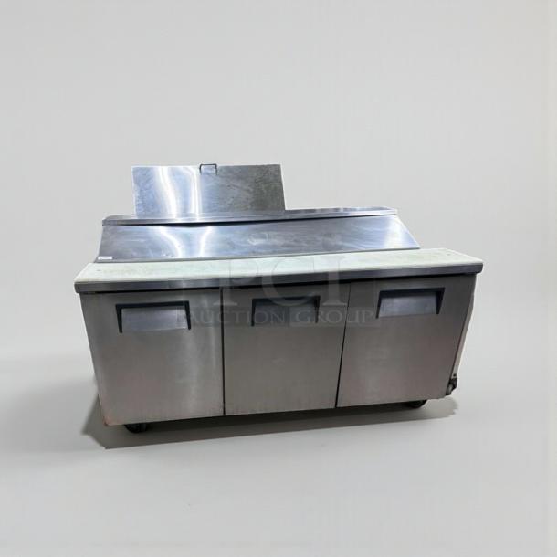 True TSSU-72-18 refrigerated prep table, 72", 3-door, high-grade condition, fully tested, NSF & UL listed.