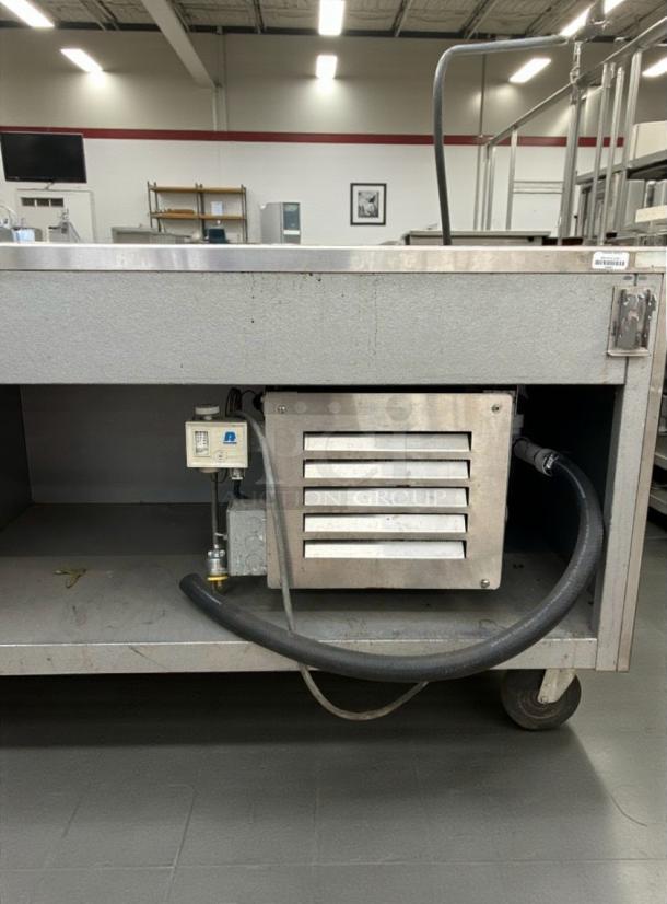Immaculate Randell RAN IC-5S refrigerated serving counter in stainless steel, 115V, single phase, fully tested, on casters.