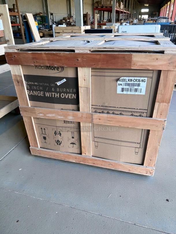Brand new Koolmore 36" gas range with oven, model KM-CRG36-NG, scratch & dent, crated. Labels indicate natural gas use.