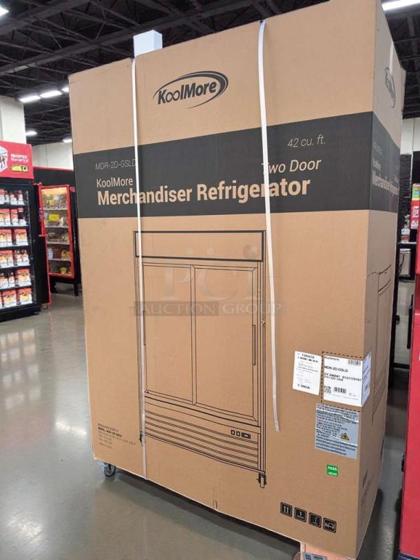 Brand New KoolMore 53" Two-Door Glass Merchandiser Refrigerator (Model MDR-2D-GSLD) in box, 42 cu. ft., item tags visible.