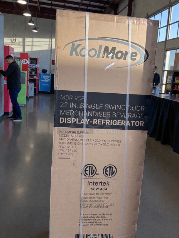 Brand new KoolMore MDR-9CP Electric Merchandiser Refrigerator, 9 Cu. Ft., scratch & dent. Box features model and certification labels.