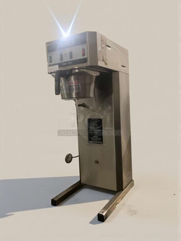 Pristine FETCO TBS-21A commercial tea brewer, 120V, single phase, fully tested, stainless steel, model label visible.