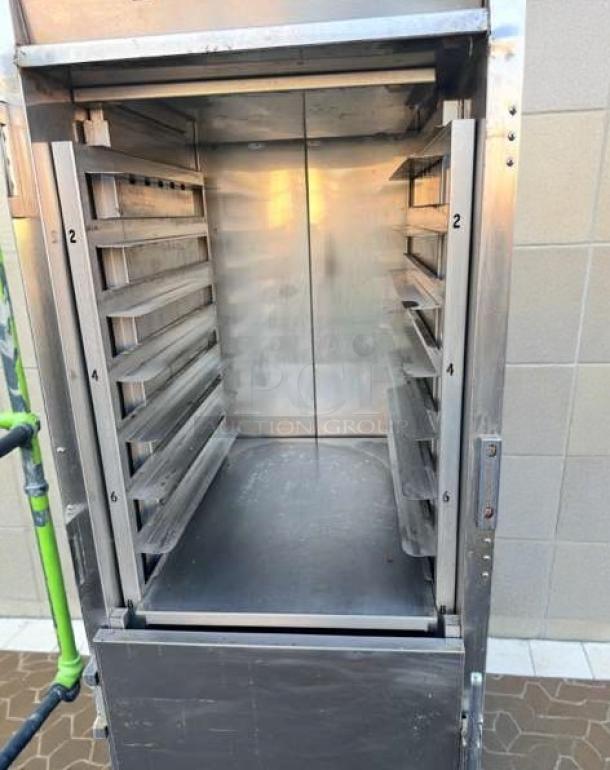 FWE TST-16-EPL full-height heated holding cabinet in outstanding condition. Interior shelves visible, fully tested and working.