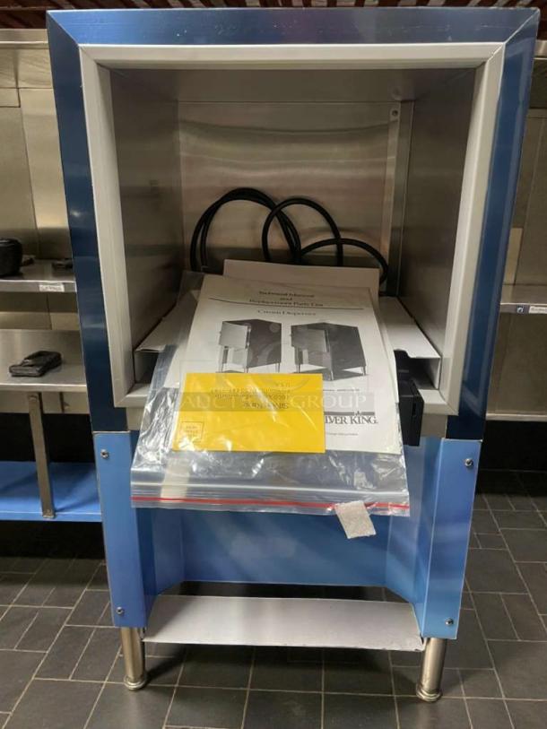 Silver King refrigerated cream dispenser, model SKNES2B/3B, in excellent condition. Includes manuals and accessories.