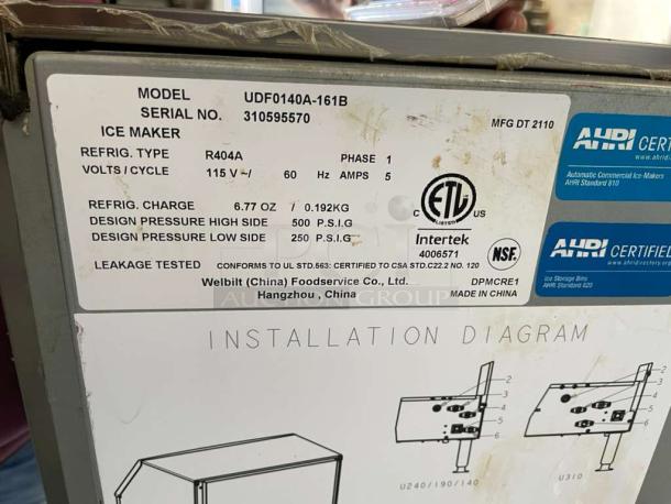 Manitowoc UDF0140A-161B ice maker in excellent condition, 115V, tested working. Includes model, serial number, and certification labels.