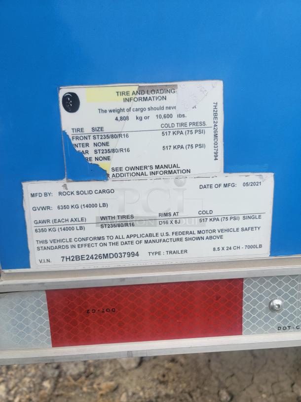 Rock Solid Cargo 24' food trailer label showing tire, loading info, VIN 7HZBE2426MD037994, and date of manufacture 05/2021.