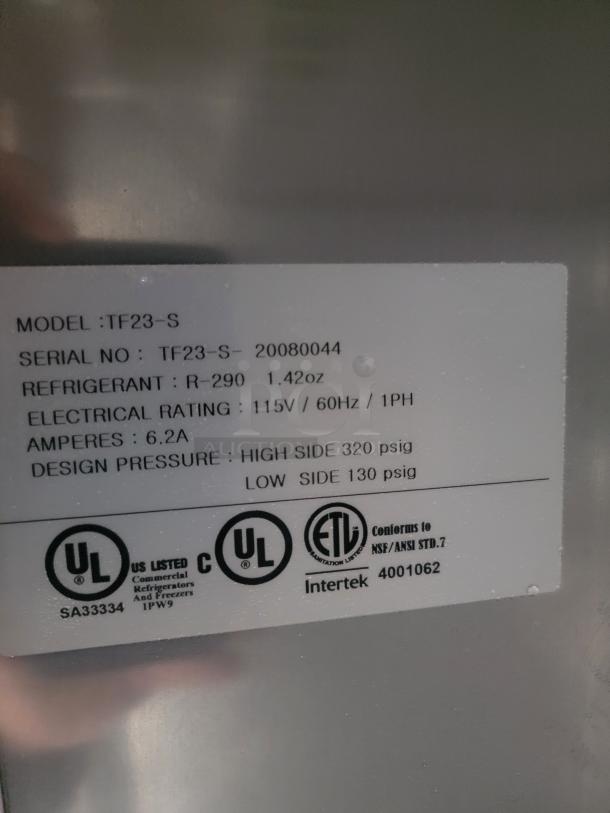 Label on commercial equipment showing model TF23-S, serial TF23-S-20080044, refrigerant R-290, electrical specs, UL and ETL logos.